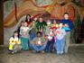 Wally Rainbow with refugee children and one dad (thanks, Mom, for creating this wonderful clown costume)