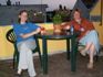 Mariellyn and Wallyce enjoy the furniture on Mariellyn's balcony