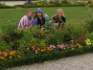 Stelli K., Wallyce and Katka sneaking behind the blooms for a quick shot in Vienna