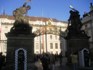 Ouch! that has to hurt...look at what the guys over the gate (Prague Castle) are doing...