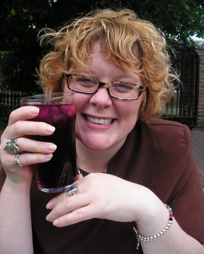 Picture of me as I visited the UK and sampled my favorite English pub drink (black currant and lemonade...a non alcoholic fizzy drink that makes my smile sparkle)